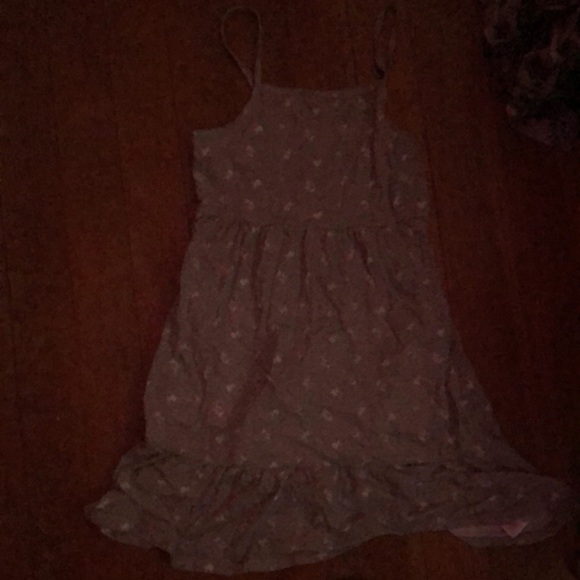 It’s a gray and white dress, it has white flowers and the rest is gray - Picture 1 of 1